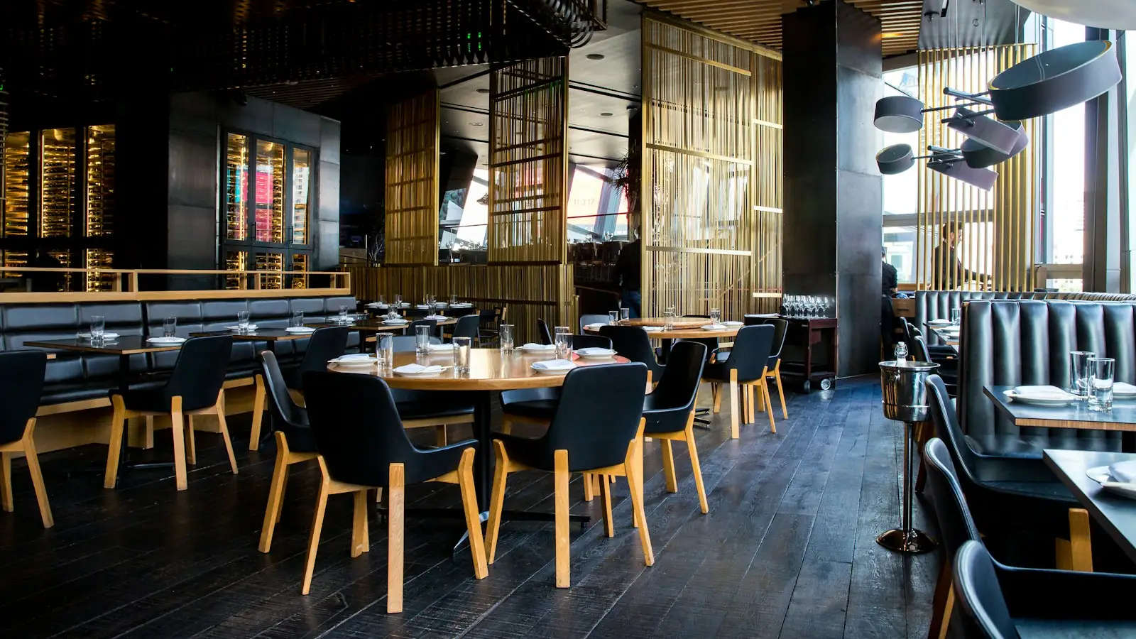 Modern restaurant dining room with set tables