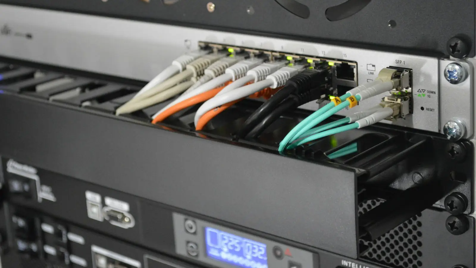 Network switch with fibre-optic cables connected